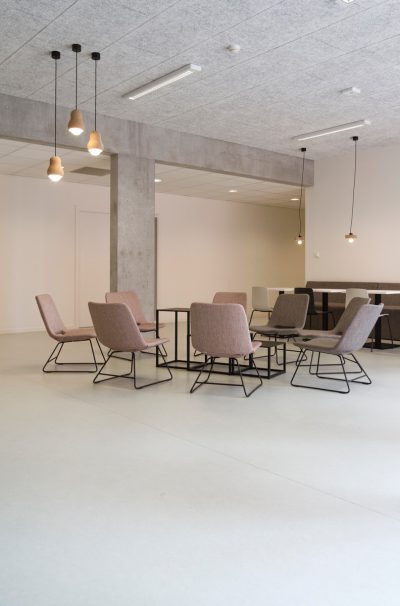 brown fabric padded sofa set inside room